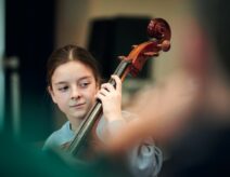 A young musician enjoying Jazz Camp for Girls in Manchester in 2022 run by Jazz North UK
