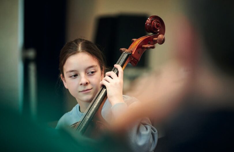 A young musician enjoying Jazz Camp for Girls in Manchester in 2022 run by Jazz North UK